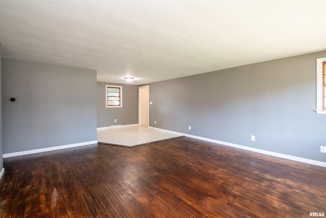 416 W Maple St, Chillicothe, IL 61523 - empty room featuring hardwood / wood-style flooring and baseboards