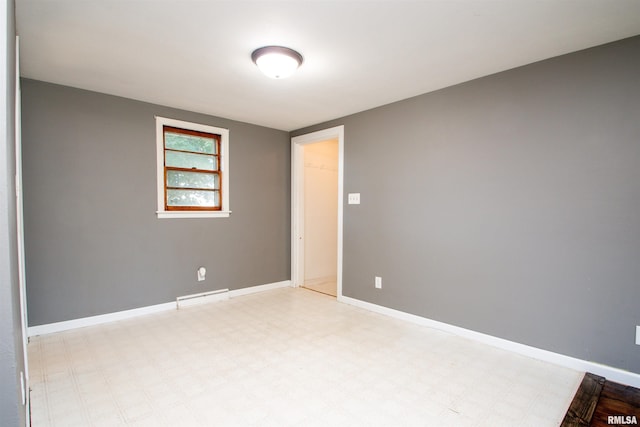 416 W Maple St, Chillicothe, IL 61523 - spare room with light flooring and baseboards