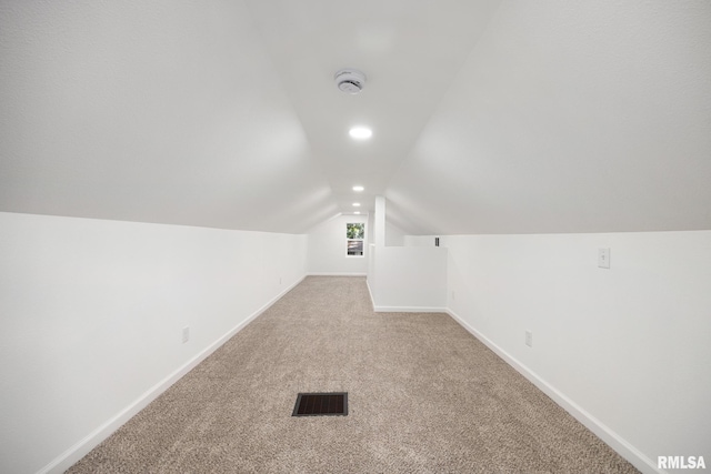 117 Hazel Ct, Creve Coeur, IL 61610 - bonus room with lofted ceiling, carpet, and recessed lighting
