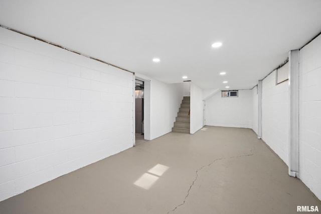 117 Hazel Ct, Creve Coeur, IL 61610 - finished below grade area with stairway, concrete block wall, and recessed lighting