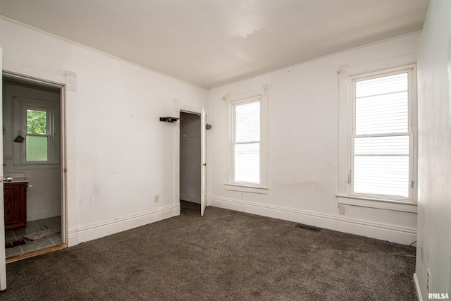 2211 N Bigelow St, Peoria, IL 61604 - unfurnished room with carpet and baseboards