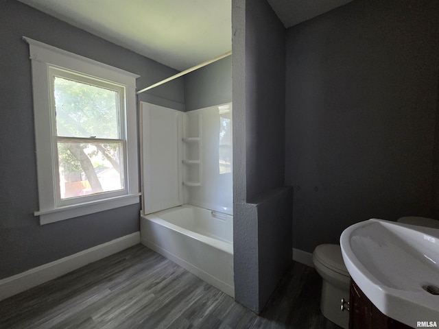 1310 N Sheridan Rd, Peoria, IL 61606 - full bathroom with wood finished floors, shower / bath combination, and vanity