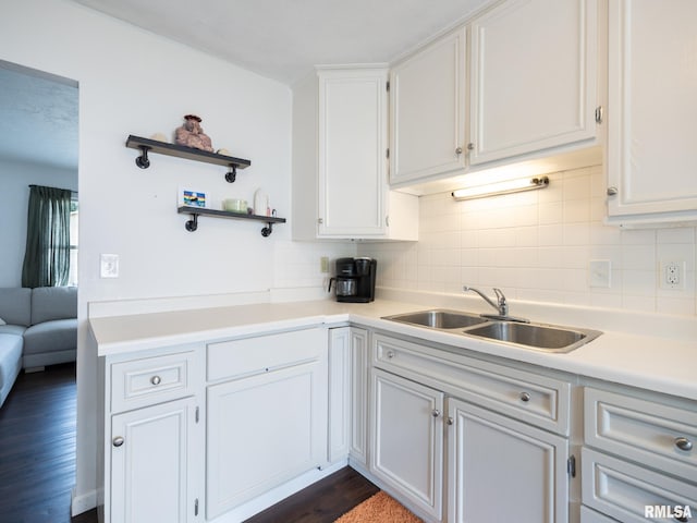 6110 N Idlewhile Dr, Peoria, IL 61614 - kitchen with decorative backsplash, light countertops, white cabinetry, dark wood finished floors, and open shelves