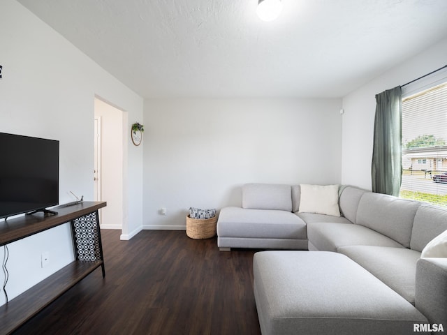 6110 N Idlewhile Dr, Peoria, IL 61614 - living area with dark wood-style floors and baseboards