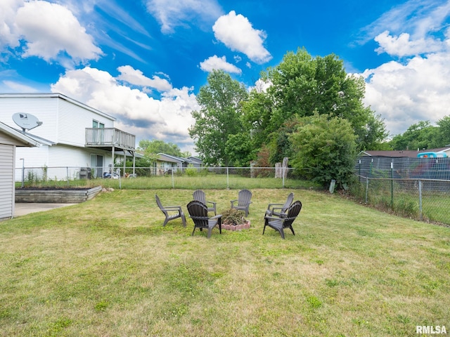 6110 N Idlewhile Dr, Peoria, IL 61614 - fenced backyard with a fire pit