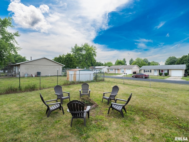 6110 N Idlewhile Dr, Peoria, IL 61614 - view of yard with an outdoor fire pit and a residential view