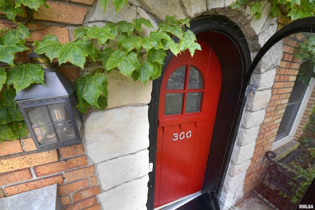300 E Embert Pl, Peoria, IL 61603 - view of exterior entry featuring brick siding