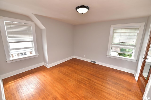 300 E Embert Pl, Peoria, IL 61603 - spare room with light wood-style floors and baseboards