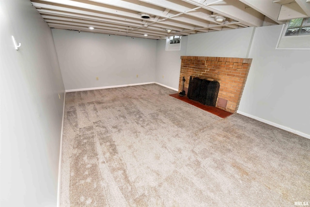 300 E Embert Pl, Peoria, IL 61603 - basement featuring carpet and a brick fireplace