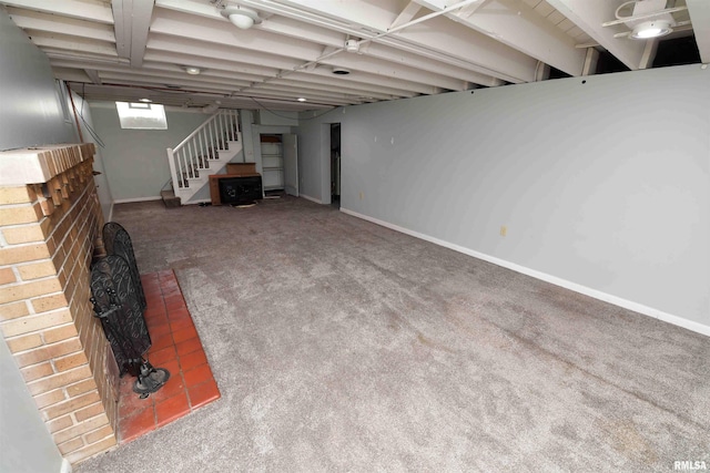 300 E Embert Pl, Peoria, IL 61603 - below grade area featuring stairs and carpet floors