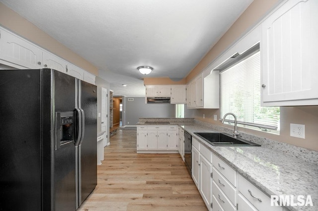 470 E Hazelwood St, Morton, IL 61550 - kitchen with black appliances, white cabinetry, a peninsula, light wood finished floors, and light stone countertops