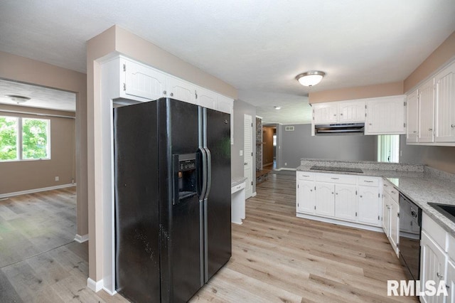 470 E Hazelwood St, Morton, IL 61550 - kitchen featuring black appliances, white cabinets, a peninsula, under cabinet range hood, and light wood-type flooring