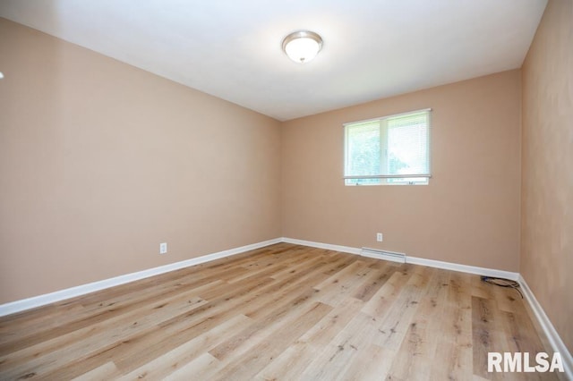 470 E Hazelwood St, Morton, IL 61550 - spare room featuring baseboards and wood finished floors