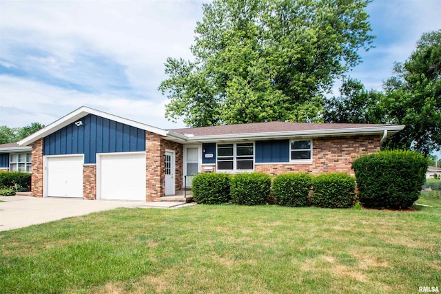 339 N Dr, Morton, IL 61550 - ranch-style home featuring brick siding, a garage, and a front yard