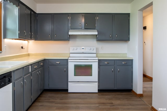 339 N Dr, Morton, IL 61550 - kitchen with white appliances, extractor fan, dark wood-style floors, and light countertops