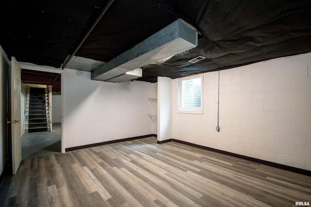 339 N Dr, Morton, IL 61550 - below grade area featuring wood finished floors and stairway