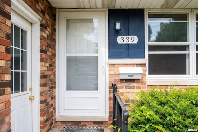 339 N Dr, Morton, IL 61550 - doorway to property with brick siding and covered porch