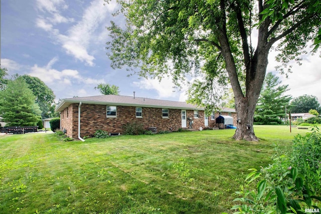 339 N Dr, Morton, IL 61550 - back of property with a yard and brick siding
