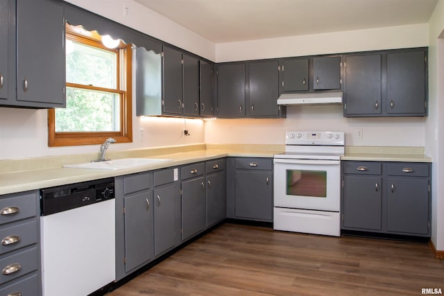 339 N Dr, Morton, IL 61550 - kitchen with white appliances, exhaust hood, dark wood-type flooring, and light countertops
