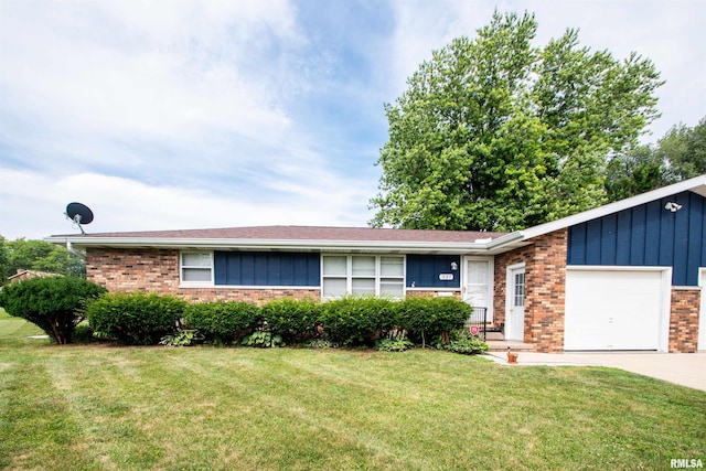 337 N Dr, Morton, IL 61550 - ranch-style home with brick siding, board and batten siding, a garage, a front yard, and concrete driveway