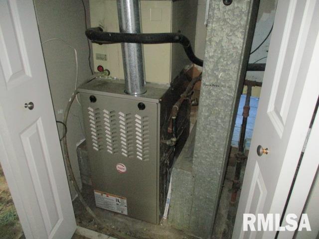 203 Arrow St, Pekin, IL 61554 - utility room with heating unit