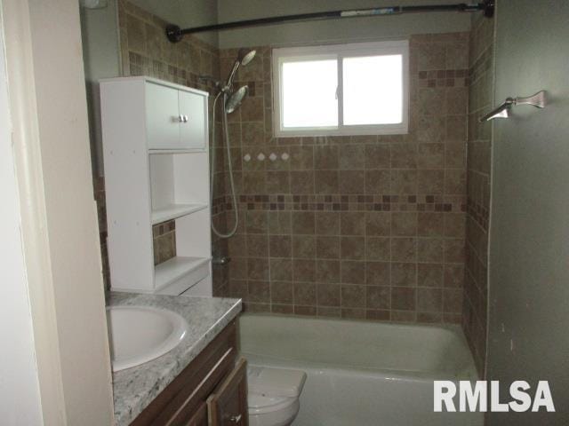 203 Arrow St, Pekin, IL 61554 - bathroom with vanity and shower / bath combination
