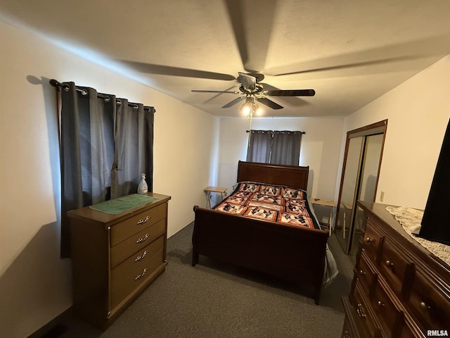 628 E Macarthur Ave, Lewistown, IL 61542 - bedroom featuring dark carpet and ceiling fan