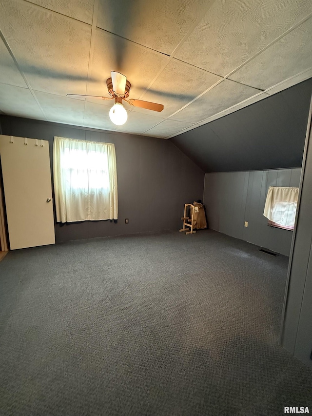 628 E Macarthur Ave, Lewistown, IL 61542 - bonus room featuring vaulted ceiling, carpet, and a ceiling fan