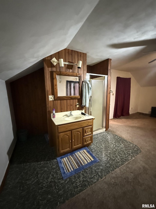 628 E Macarthur Ave, Lewistown, IL 61542 - full bath featuring lofted ceiling, a stall shower, vanity, wood walls, and ceiling fan