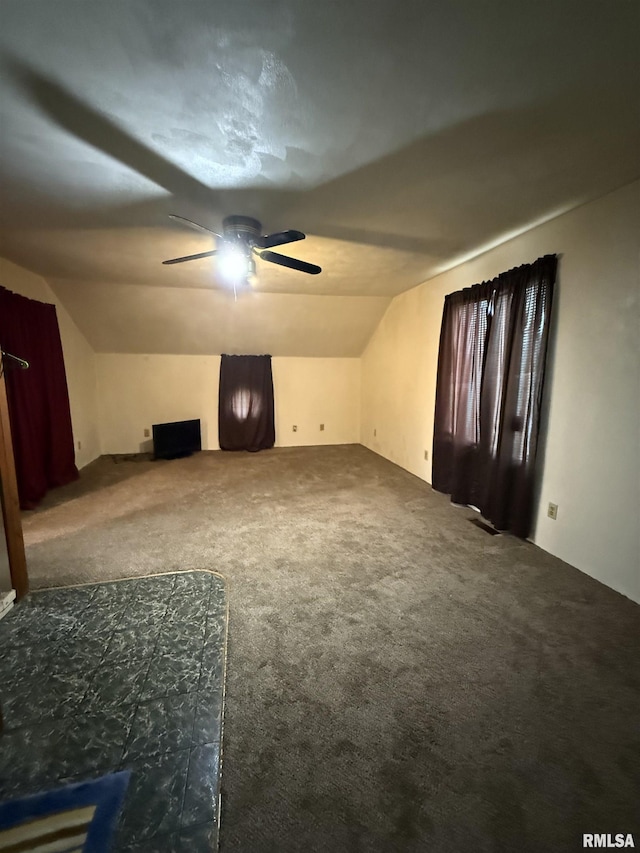 628 E Macarthur Ave, Lewistown, IL 61542 - additional living space featuring carpet floors, lofted ceiling, and a ceiling fan