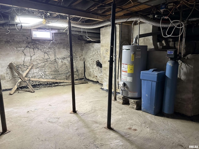 628 E Macarthur Ave, Lewistown, IL 61542 - basement featuring gas water heater and a water softener