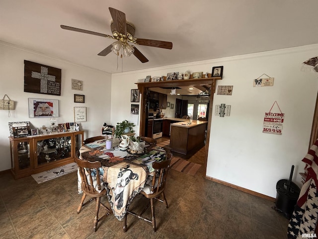 628 E Macarthur Ave, Lewistown, IL 61542 - dining space with crown molding and ceiling fan