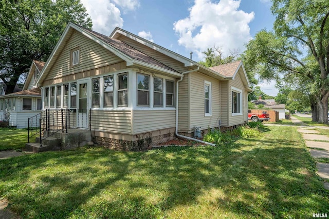 339 Herman St, Pekin, IL 61554 - view of front of home with a front lawn and roof with shingles