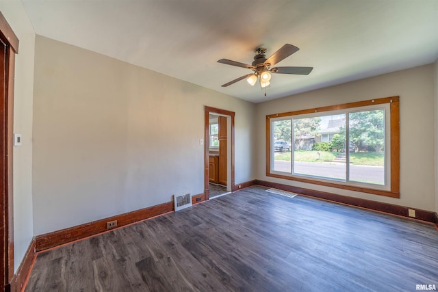 339 Herman St, Pekin, IL 61554 - unfurnished room featuring dark wood finished floors and a ceiling fan