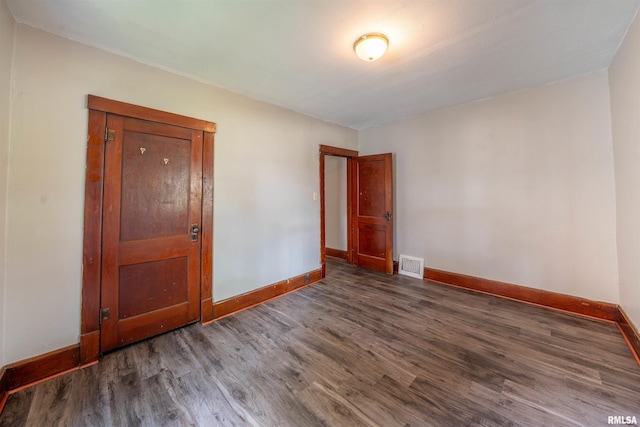 339 Herman St, Pekin, IL 61554 - unfurnished room with baseboards and wood finished floors