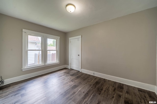 339 Herman St, Pekin, IL 61554 - unfurnished room with dark wood-style floors and baseboards