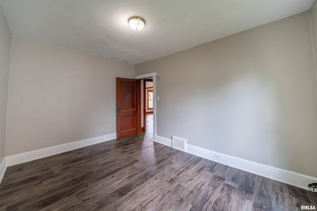 339 Herman St, Pekin, IL 61554 - unfurnished room with dark wood finished floors and baseboards