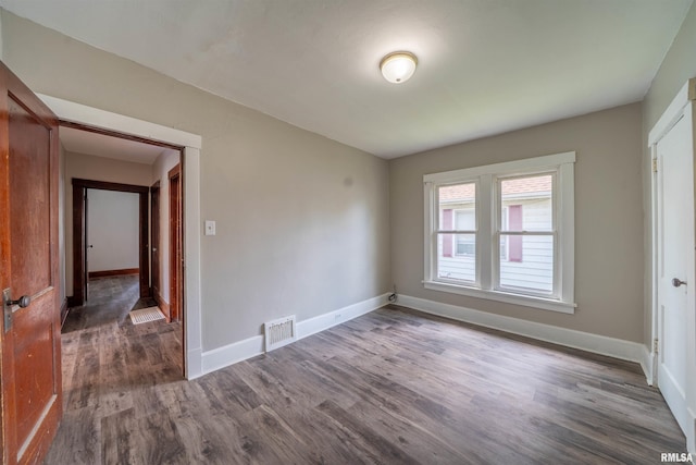 339 Herman St, Pekin, IL 61554 - spare room featuring wood finished floors and baseboards