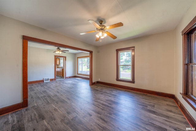 339 Herman St, Pekin, IL 61554 - spare room featuring dark wood-type flooring and ceiling fan