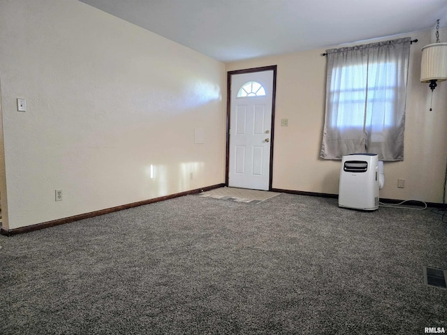 403 Koch St, Pekin, IL 61554 - foyer entrance with baseboards and carpet floors