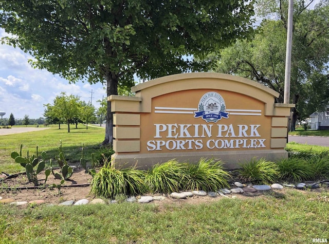 403 Koch St, Pekin, IL 61554 - community sign with a lawn
