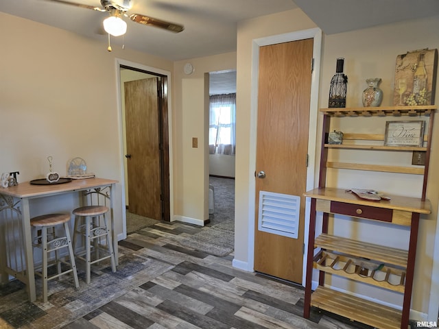 403 Koch St, Pekin, IL 61554 - hallway featuring wood finished floors and baseboards