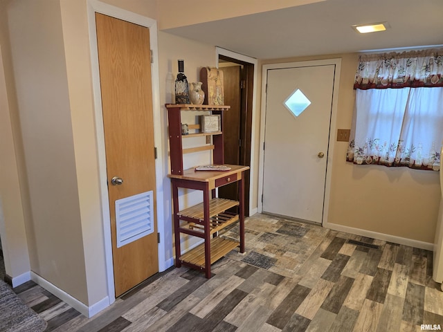 403 Koch St, Pekin, IL 61554 - foyer featuring wood finished floors and baseboards