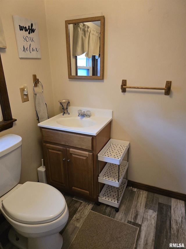 403 Koch St, Pekin, IL 61554 - bathroom with vanity and wood finished floors