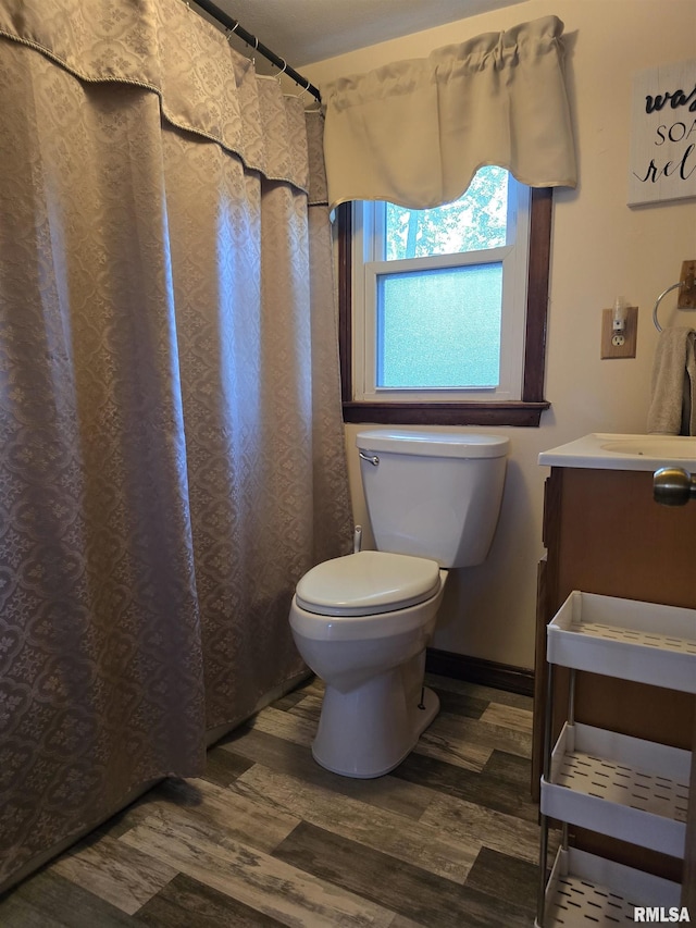 403 Koch St, Pekin, IL 61554 - full bathroom featuring wood finished floors and vanity