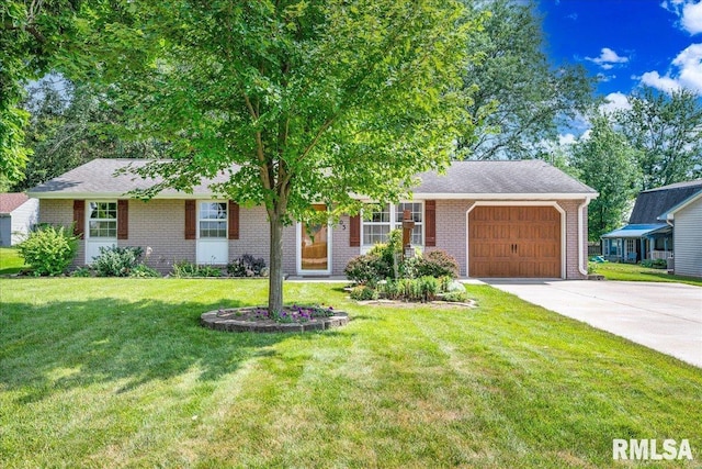 303 W 3rd Ave, Deer Creek, IL 61733 - view of front of house featuring a garage, concrete driveway, brick siding, a front lawn, and a shingled roof
