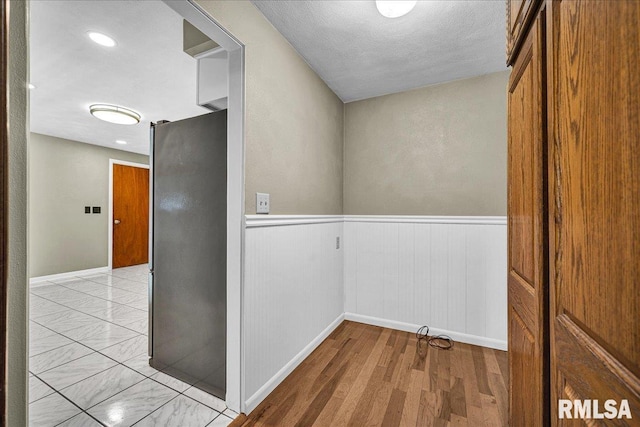 303 W 3rd Ave, Deer Creek, IL 61733 - corridor featuring wainscoting and recessed lighting