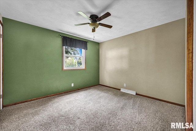 303 W 3rd Ave, Deer Creek, IL 61733 - spare room featuring carpet floors and a ceiling fan