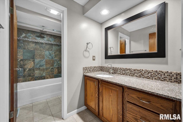 303 W 3rd Ave, Deer Creek, IL 61733 - full bath with vanity, a combined bath / shower with rainfall shower, and tile patterned flooring