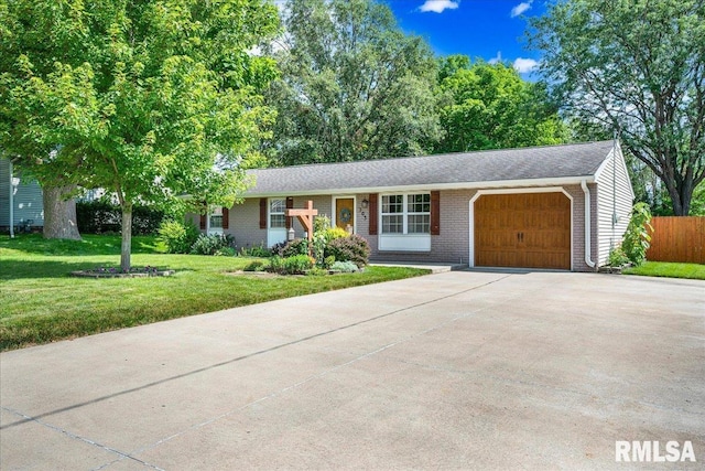 303 W 3rd Ave, Deer Creek, IL 61733 - ranch-style house featuring an attached garage, driveway, and brick siding